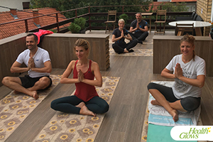 A yoga class at the 'Health Glows Culinary Weekend', 2nd - 4th October 2020 in Golubac, Serbia. At the 'Health Glows Weekend', guests learn in theory and practice how to eat a raw vegan diet, exercise daily and maintain a high level of health long-term through a healthy lifestyle.