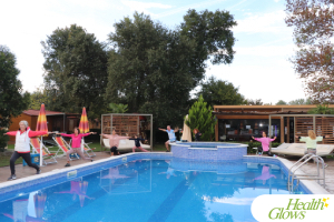 A fitness class by the pool at the 'Adriatic Fruit Festival', October 2022 in Ulcinj, Montenegro. At the 'Serbian Fruit Festival', guests learn in theory and practice how to eat a raw vegan diet, exercise daily and maintain a high level of health long-term through a healthy lifestyle.
