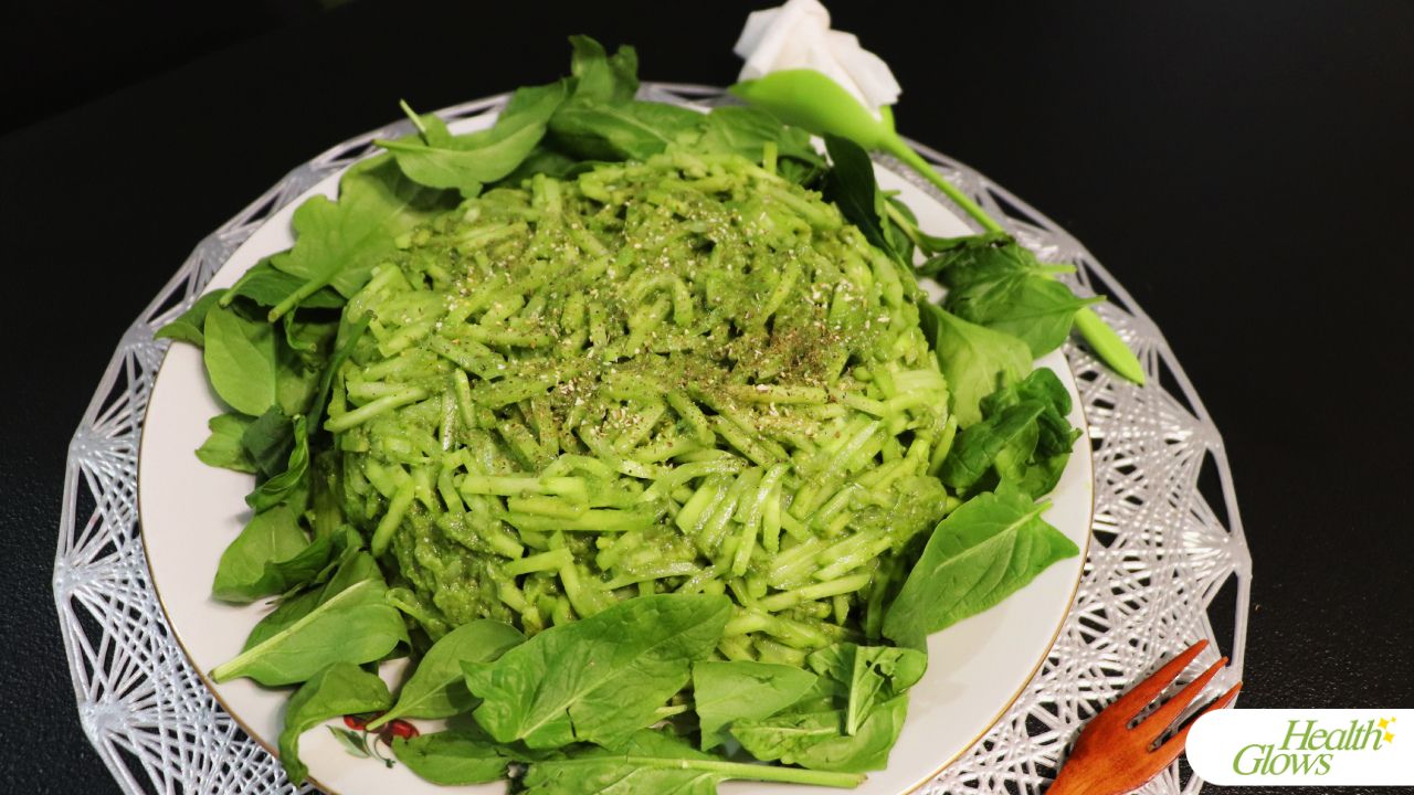 Raw vegetable spaghetti in pesto - one of the recipes from the recipe book 'Raw for Glow'.