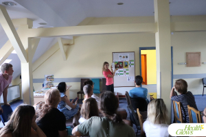 Marina from 'Health Glows' teaching about tropical fruits at the 'Serbian Fruit Festival' 2023. 'Serbian Fruit Festival' - a 4-day event at which you get the opportunity to eat a raw vegan diet, exercise and get professional education on a raw diet and natural health.