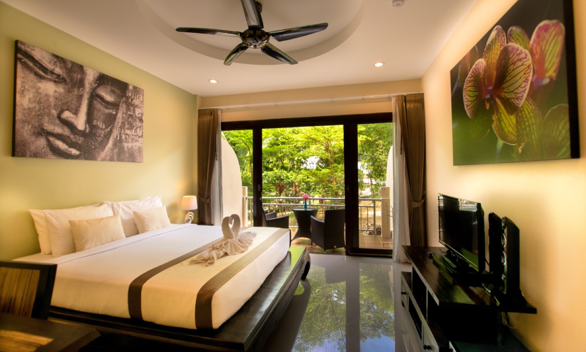 Private deluxe room with a balcony at the 'Health Glows Thai Retreat' 2025.