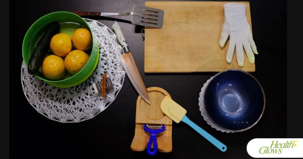 Ingredients and equipment for preparing a raw vegan lunch - persimmons pudding and a cucumber.