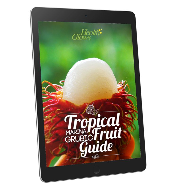 Tablet showing the cover of the Tropical Fruit Guide e-book on the screen.
